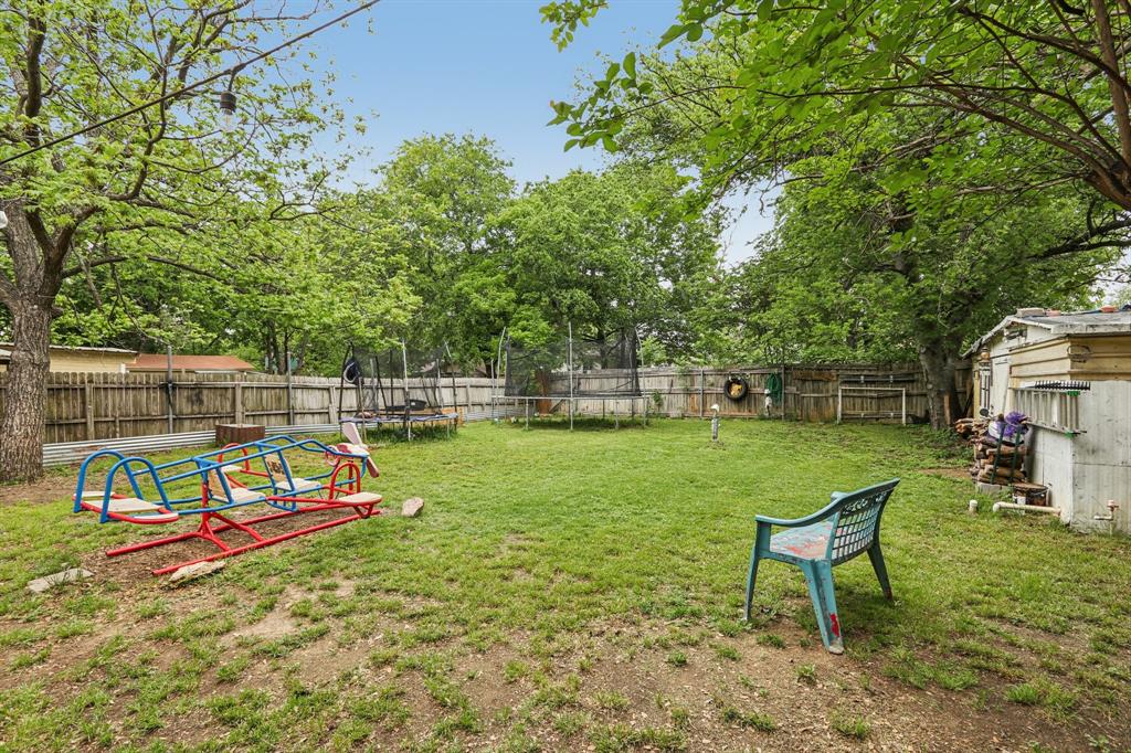 426 West Lake Street Krum, TX 76249 - Photo 15 of 16 a view of a park with slide