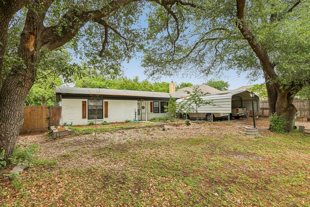 426 West Lake Street Krum, TX 76249 - Photo 2 of 16 a house view with a outdoor space