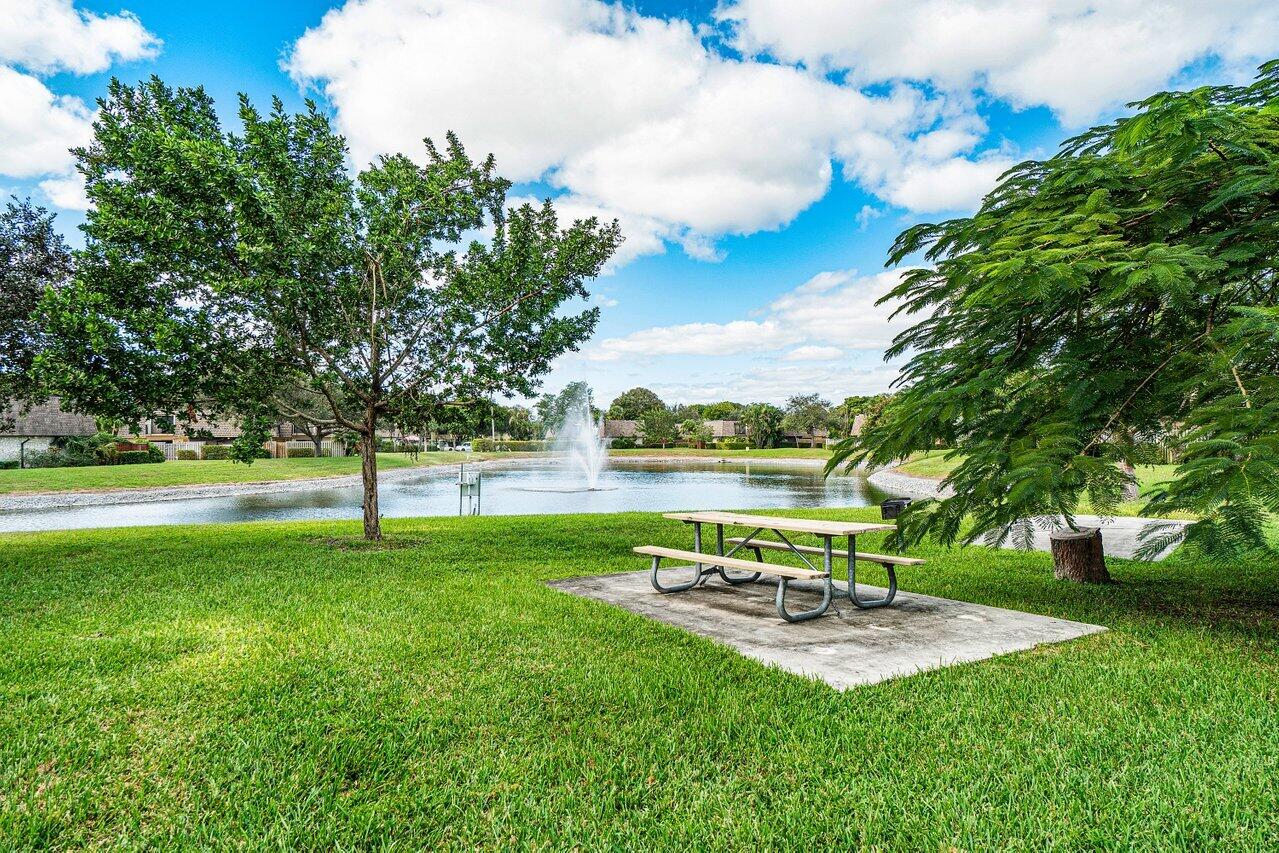 2929 Southwest 22nd Circle, Unit 32B Delray Beach, FL 33445 - Photo 27 of 27 a view of a park with large trees