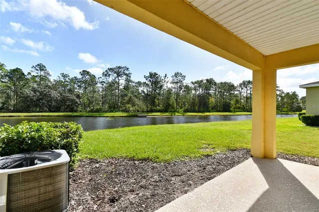 a view of a garden with a large pool