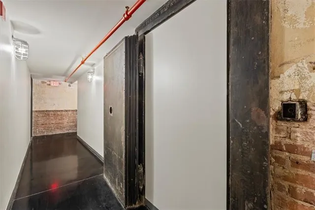 a view of a balcony with yard