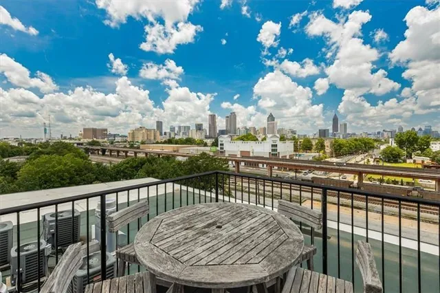 a view of swimming pool with outdoor seating