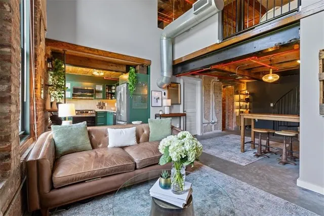 a view of a patio with couches table and chairs