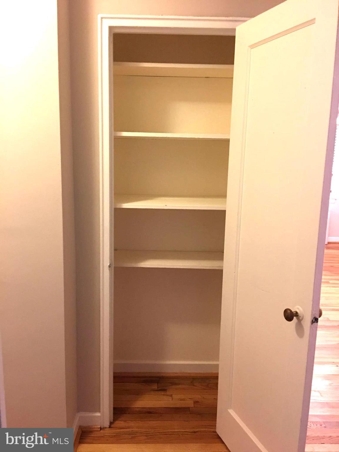 8329 Grubb Road, Unit G102 Silver Spring, MD 20910 - Photo 16 of 21 Hallway- Linen Closet