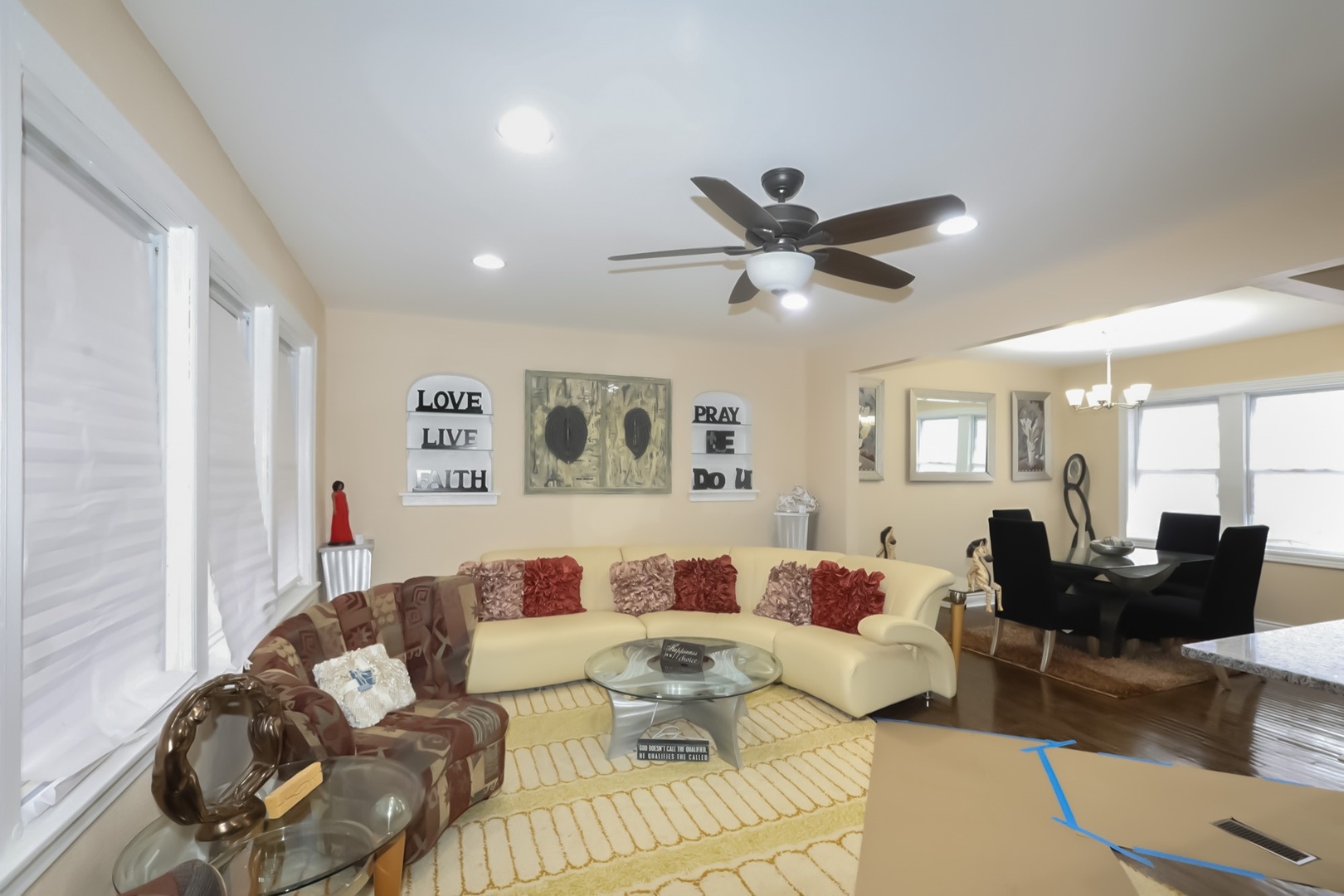 10217 South Prairie Avenue Chicago, IL 60628 - Photo 2 of 23 a living room with furniture and a large window