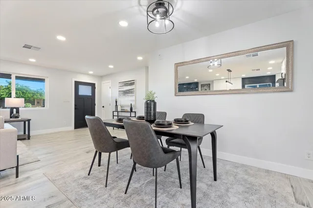 a view of a dining room with furniture