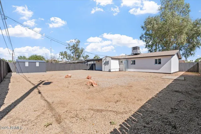 a view of swimming pool with a yard