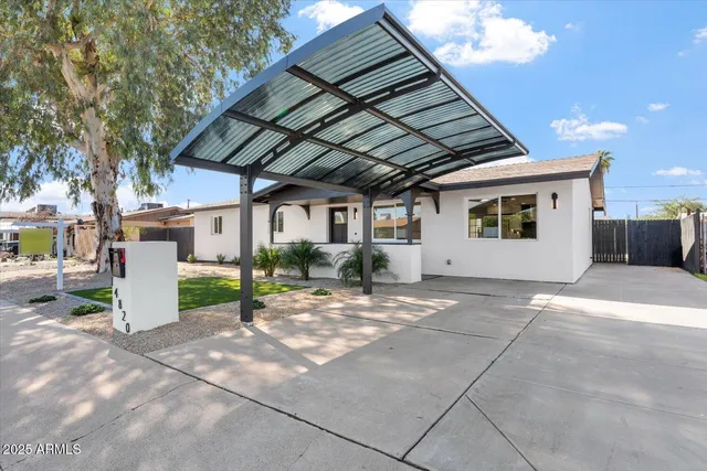a view of a barn in the yard