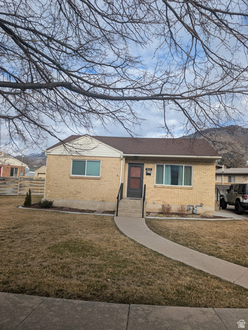866 Hillcrest Avenue Logan, UT 84321 - Photo 1 of 1 View of front of property with brick siding