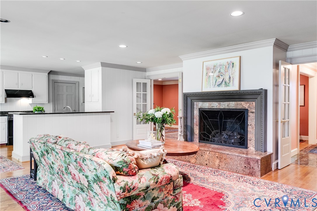 10475 Cherokee Road Richmond, VA 23235 - Photo 59 of 74 Open-concept living space featuring a fireplace wi