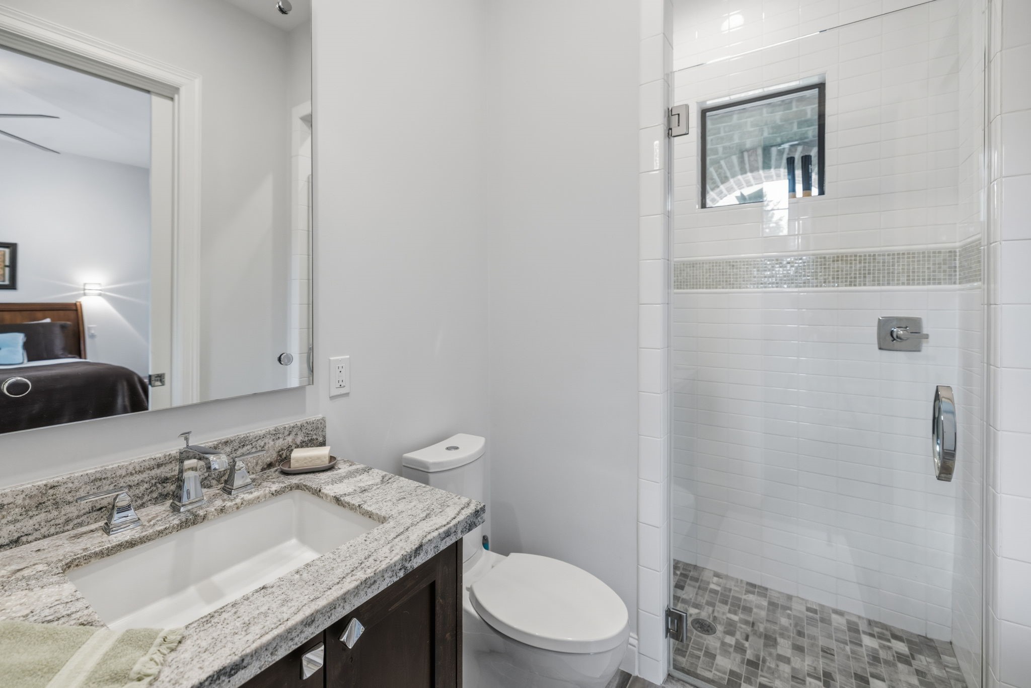 6918 Comanche Bend Montgomery, TX 77316 - Photo 47 of 50 The casita includes a full bathroom, flexible living space, and direct access to the private courtyard, creating a comfortable and inviting retreat your guests may never want to leave.