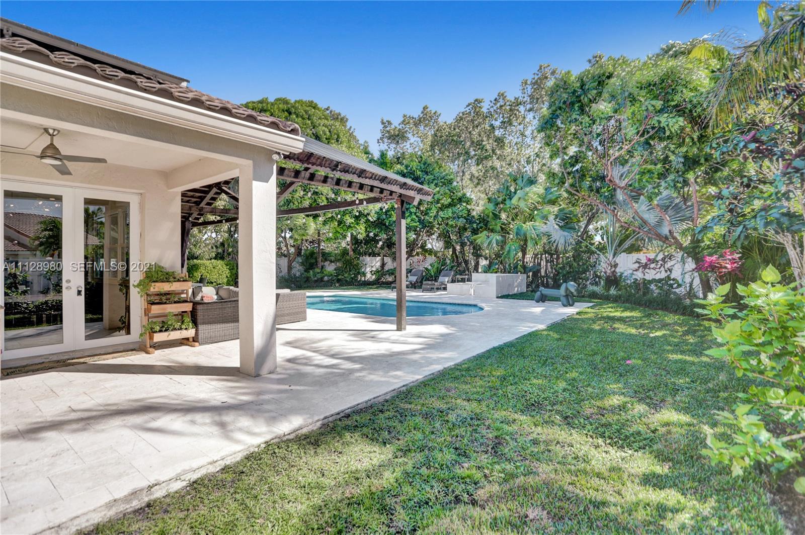 1078 Briar Ridge Road Weston, FL 33327 - Photo 11 of 41 a view of a house with backyard and sitting area