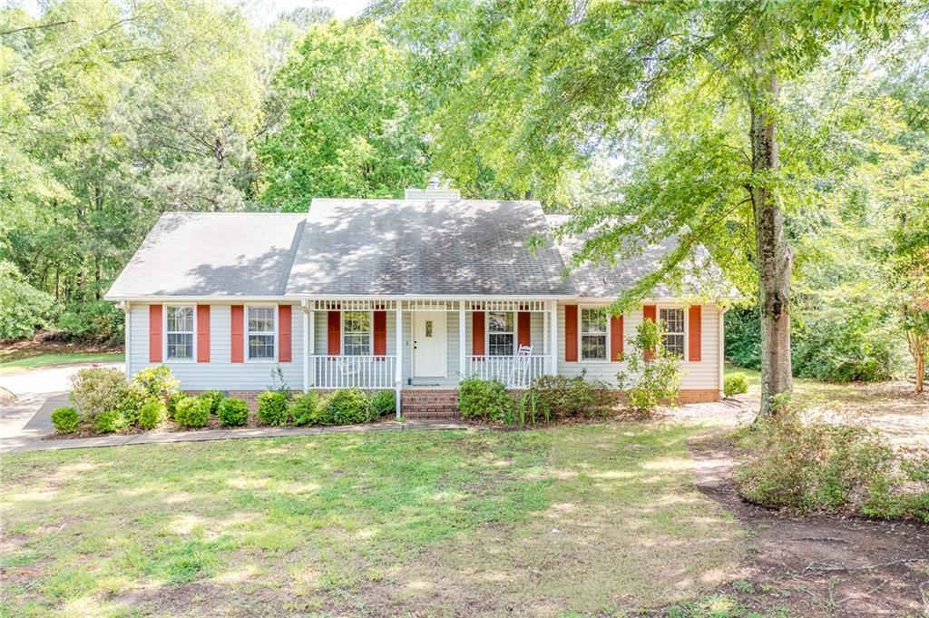 225 Ryan Road Winder, GA 30680 - Photo 1 of 1 a front view of a house with a yard