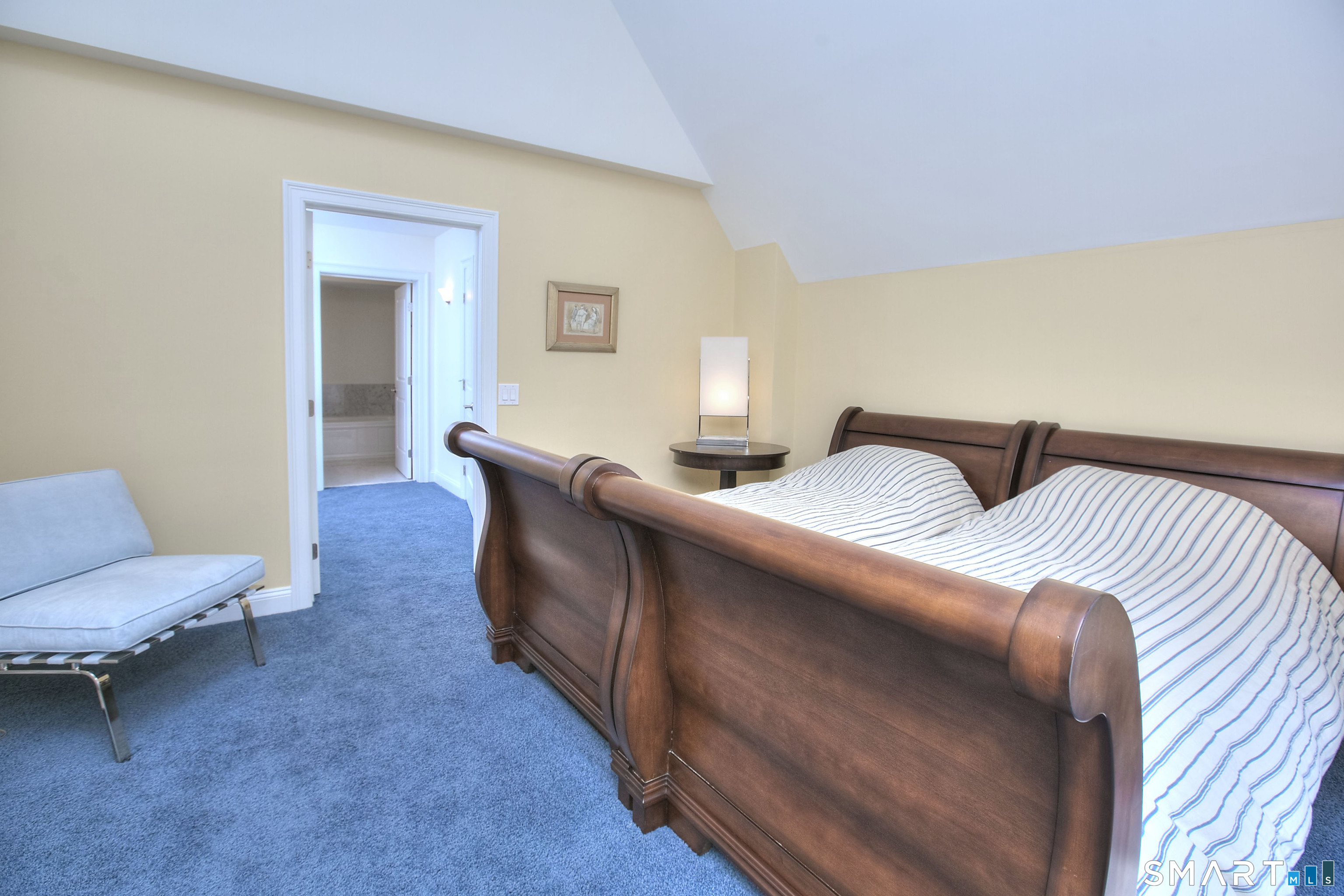 16 Hayestown Road, Unit C402 Danbury, CT 06811 - Photo 22 of 36 a bedroom with bed and a couch