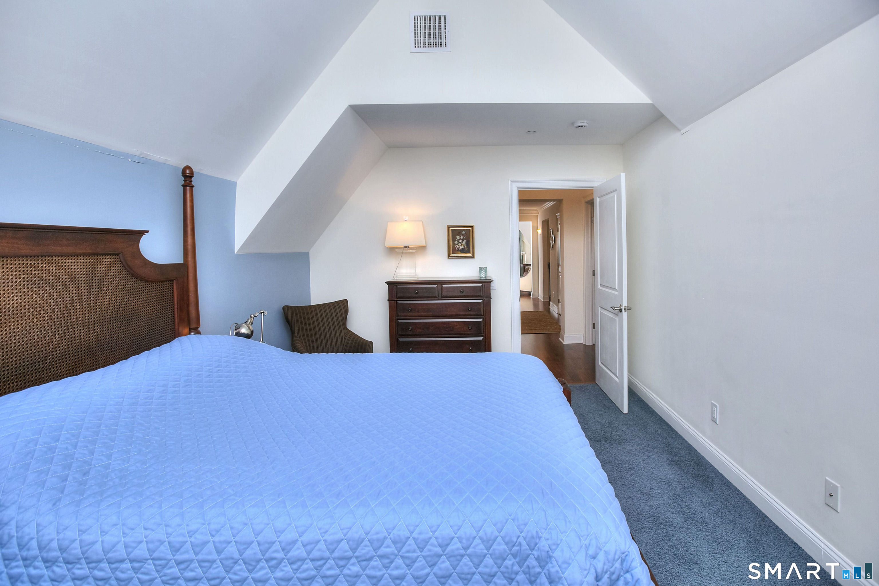 16 Hayestown Road, Unit C402 Danbury, CT 06811 - Photo 28 of 36 a bedroom with a bed and a dresser