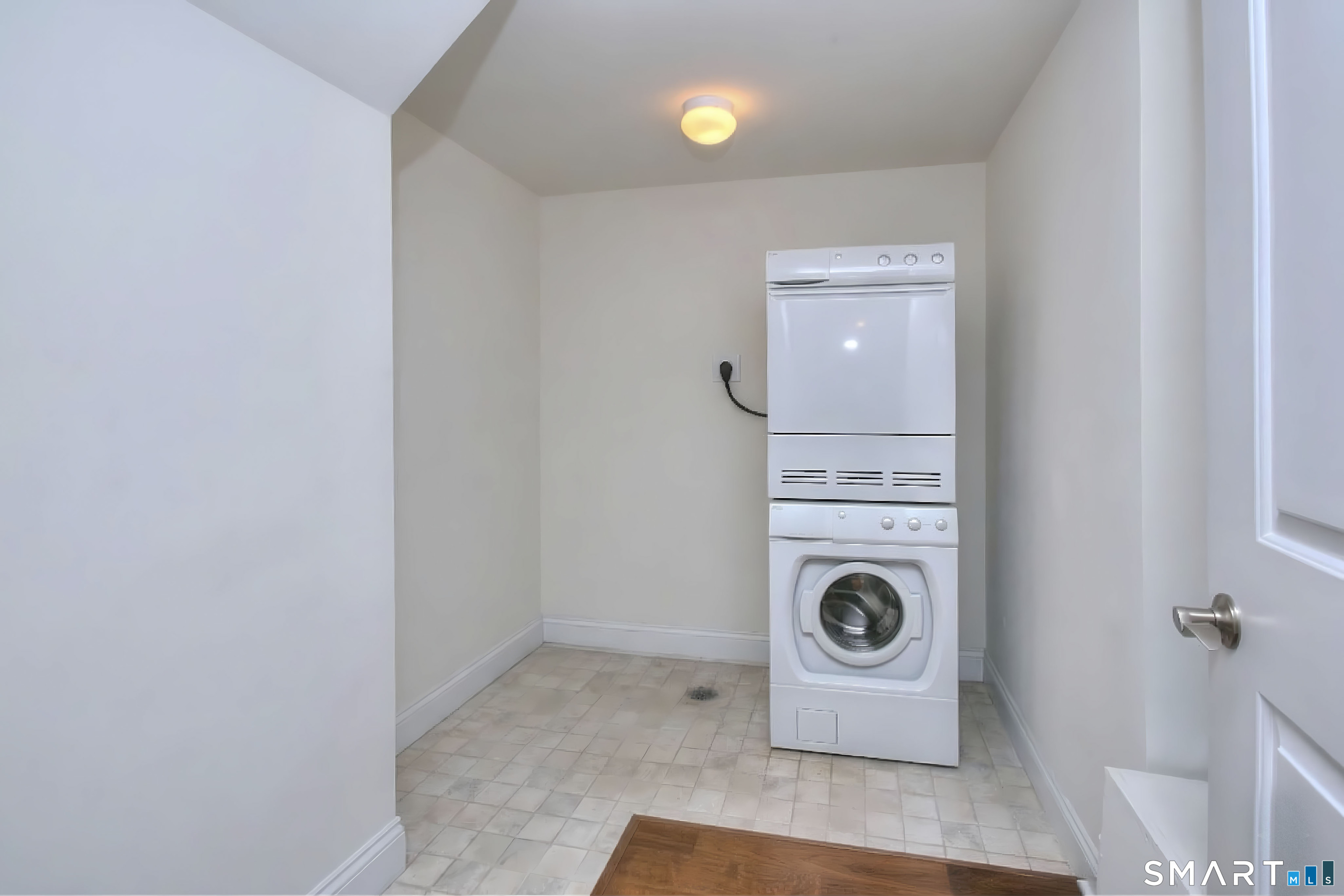 16 Hayestown Road, Unit C402 Danbury, CT 06811 - Photo 30 of 36 a utility room with dryer and washer