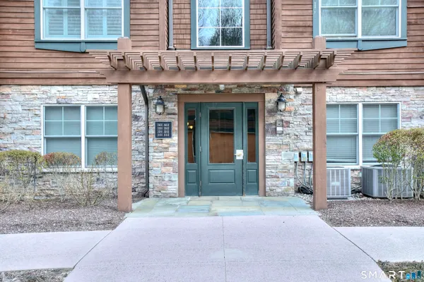 a view of a brick building with a outdoor space