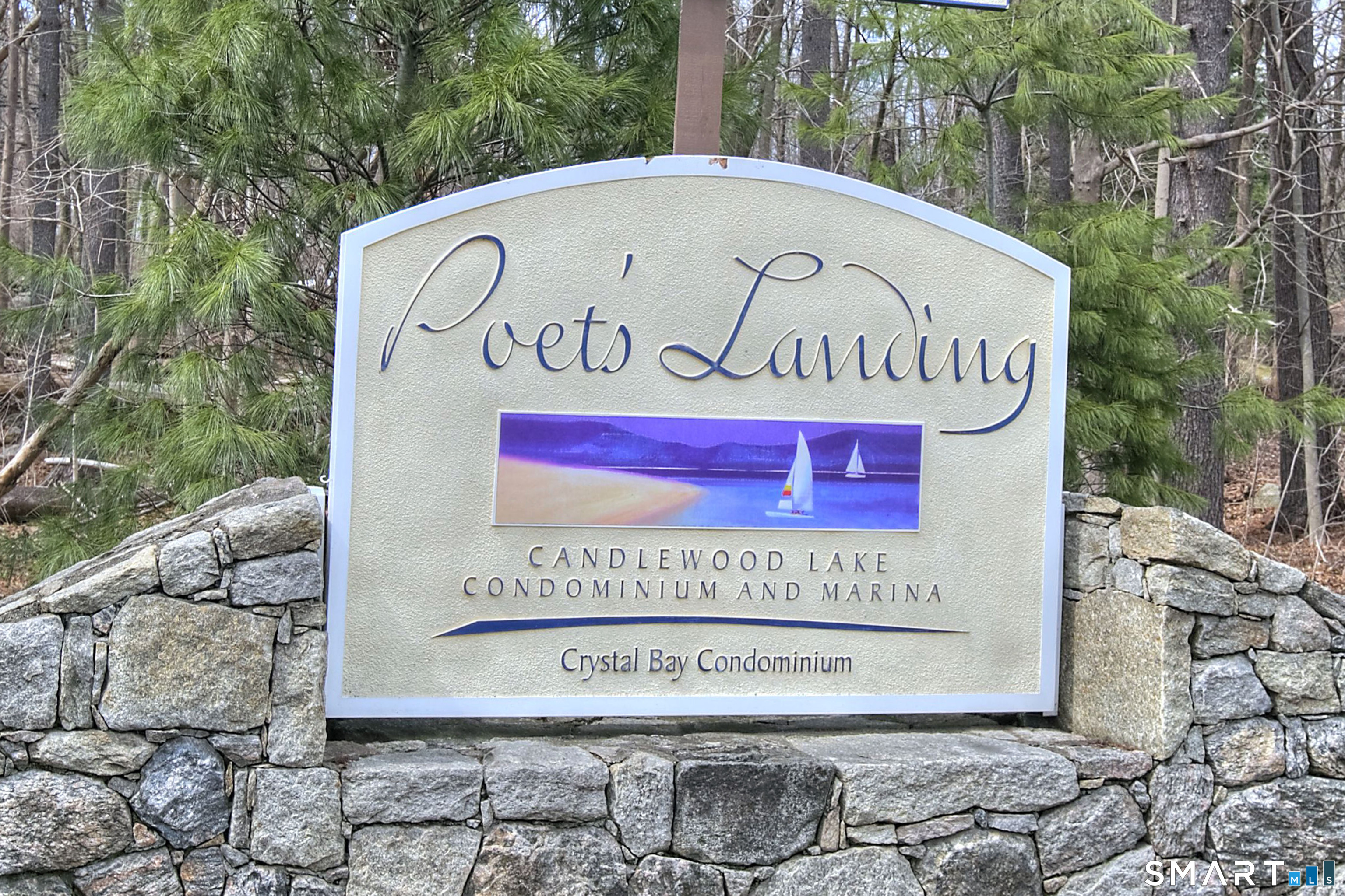 16 Hayestown Road, Unit C402 Danbury, CT 06811 - Photo 4 of 36 a sign on the side of a road