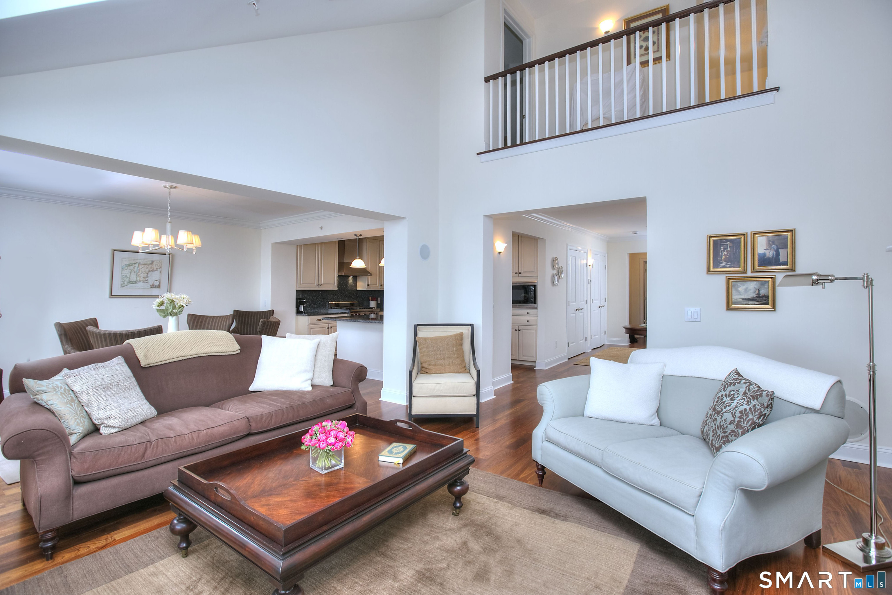 16 Hayestown Road, Unit C402 Danbury, CT 06811 - Photo 9 of 36 a living room with furniture and a rug