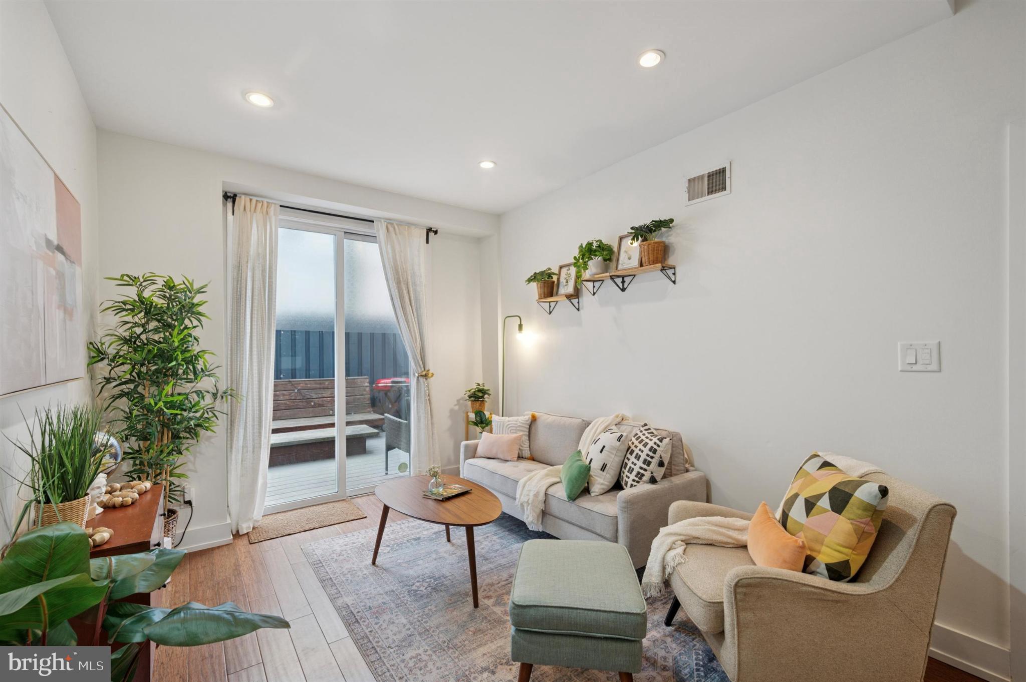 637 Cross Street Philadelphia, PA 19147 - Photo 14 of 28 a living room with furniture and a potted plant