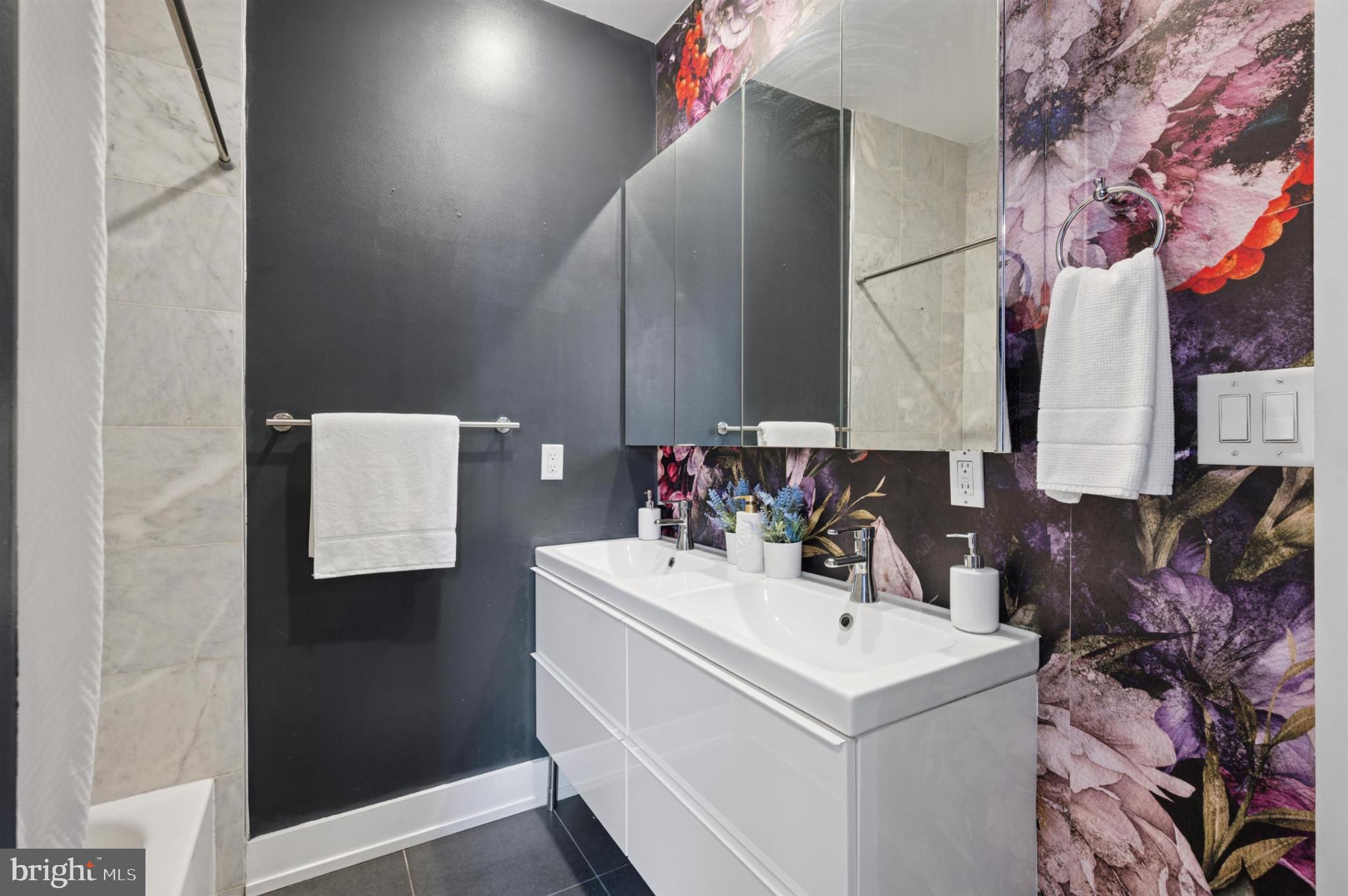 637 Cross Street Philadelphia, PA 19147 - Photo 17 of 28 a bathroom with a sink vanity and mirror