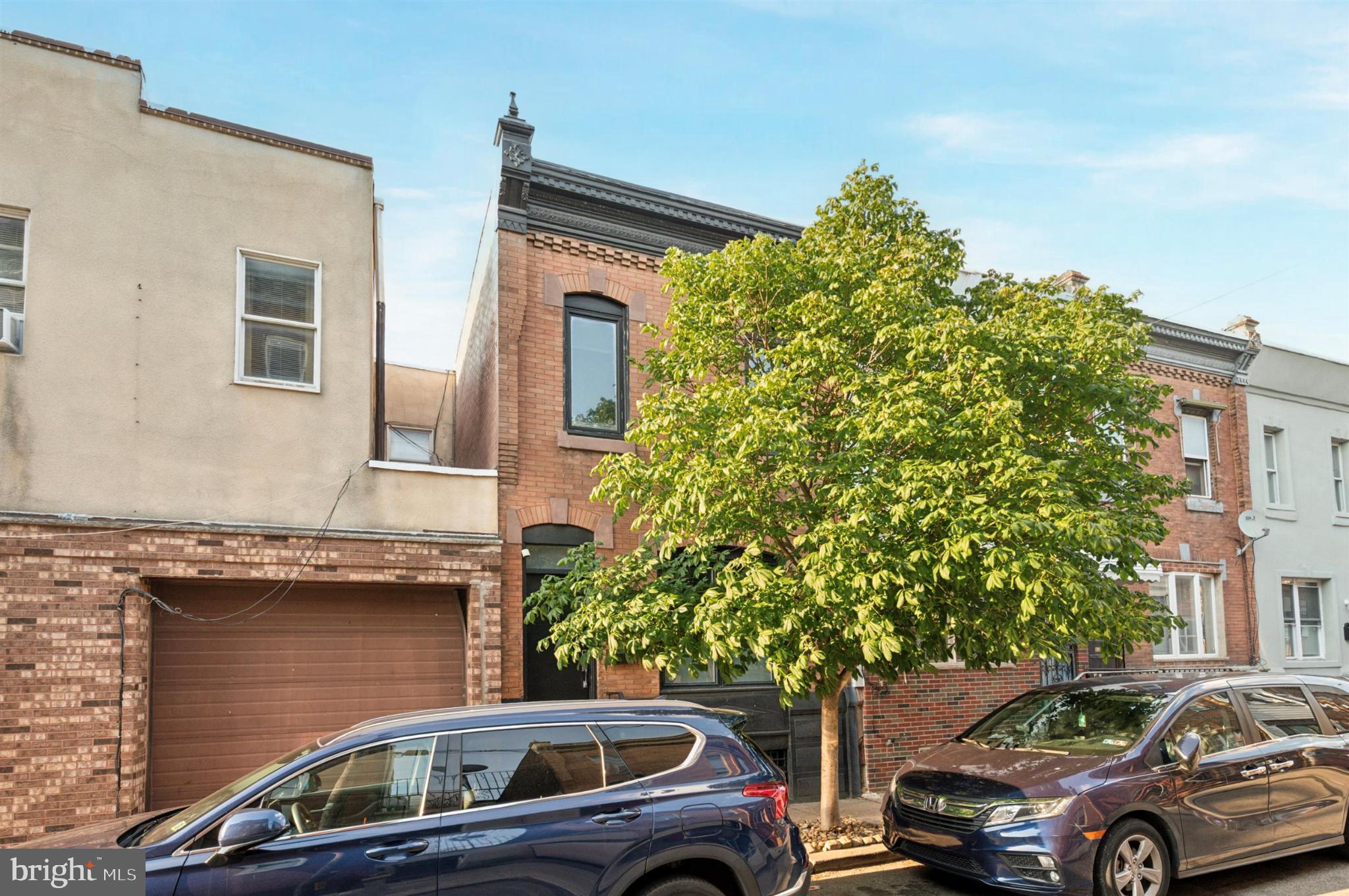 637 Cross Street Philadelphia, PA 19147 - Photo 3 of 28 a front view of a house with parking space