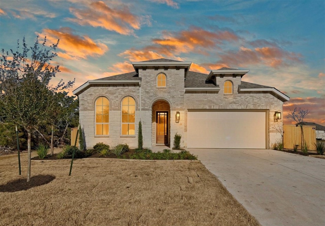 199 Five Mile Creek Way Kyle, TX 78640 - Photo 1 of 1 a front view of a house with a yard