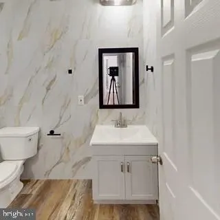 a kitchen with a sink stove and microwave