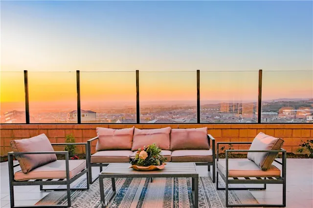 a view of a terrace with furniture