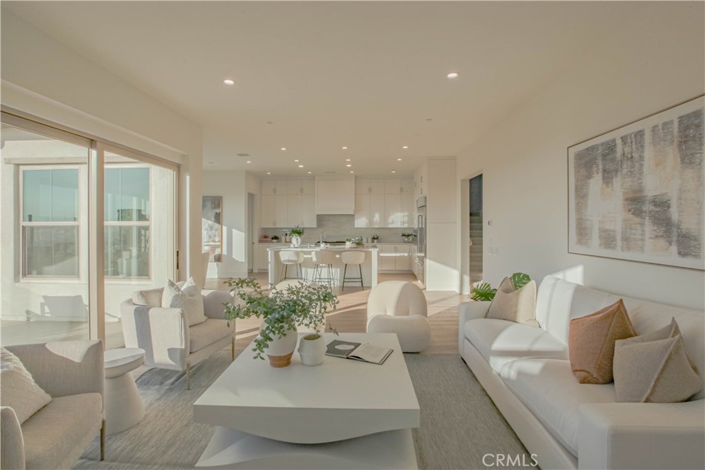 137 Oakstone Irvine, CA 92618 - Photo 18 of 54 a living room with furniture and a large window
