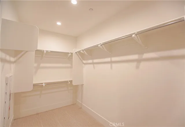 a view of a room with racks on the wall