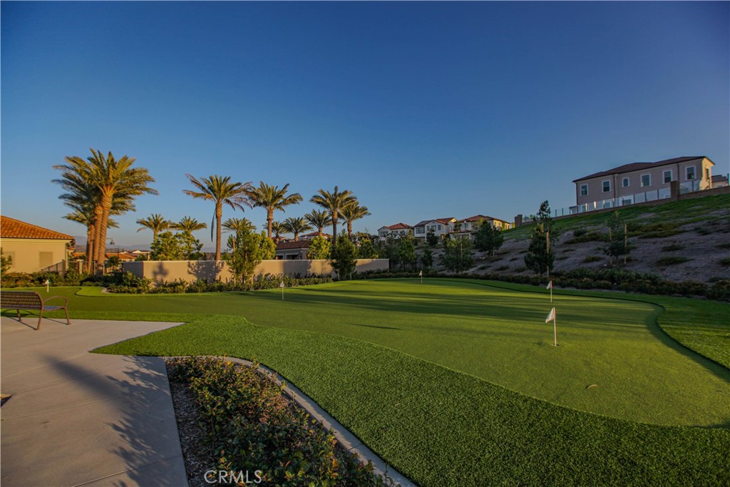 137 Oakstone Irvine, CA 92618 - Photo 35 of 54 a view of a golf course with a lake