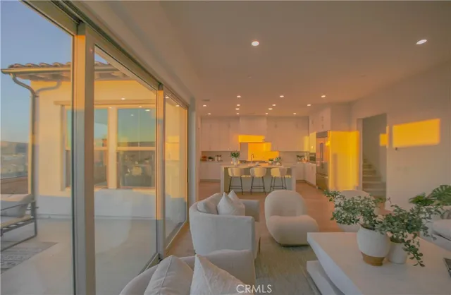 a dining room with a large window and table