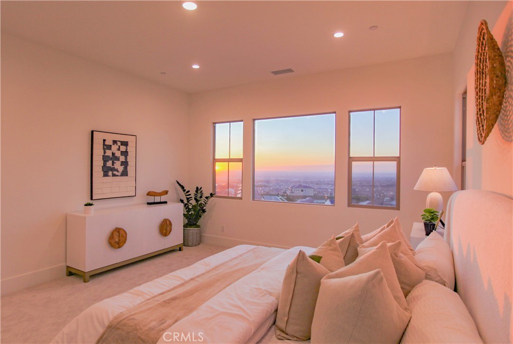 137 Oakstone Irvine, CA 92618 - Photo 5 of 54 a bed room with a bed and a window