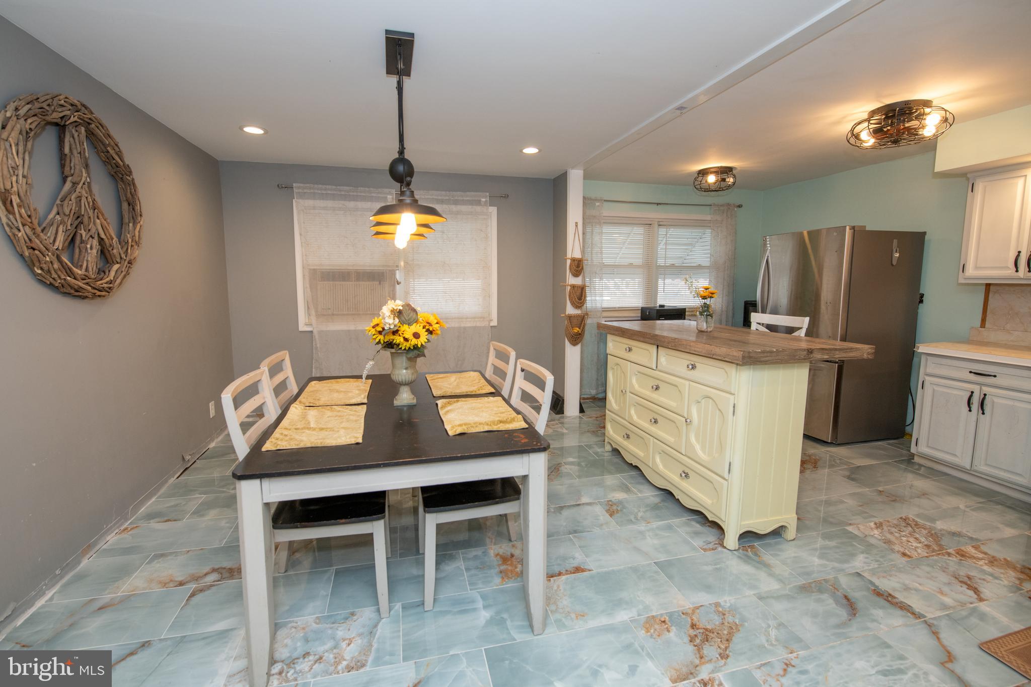 12506 Chilton Road Philadelphia, PA 19154 - Photo 20 of 55 a kitchen that has a table and chairs in it