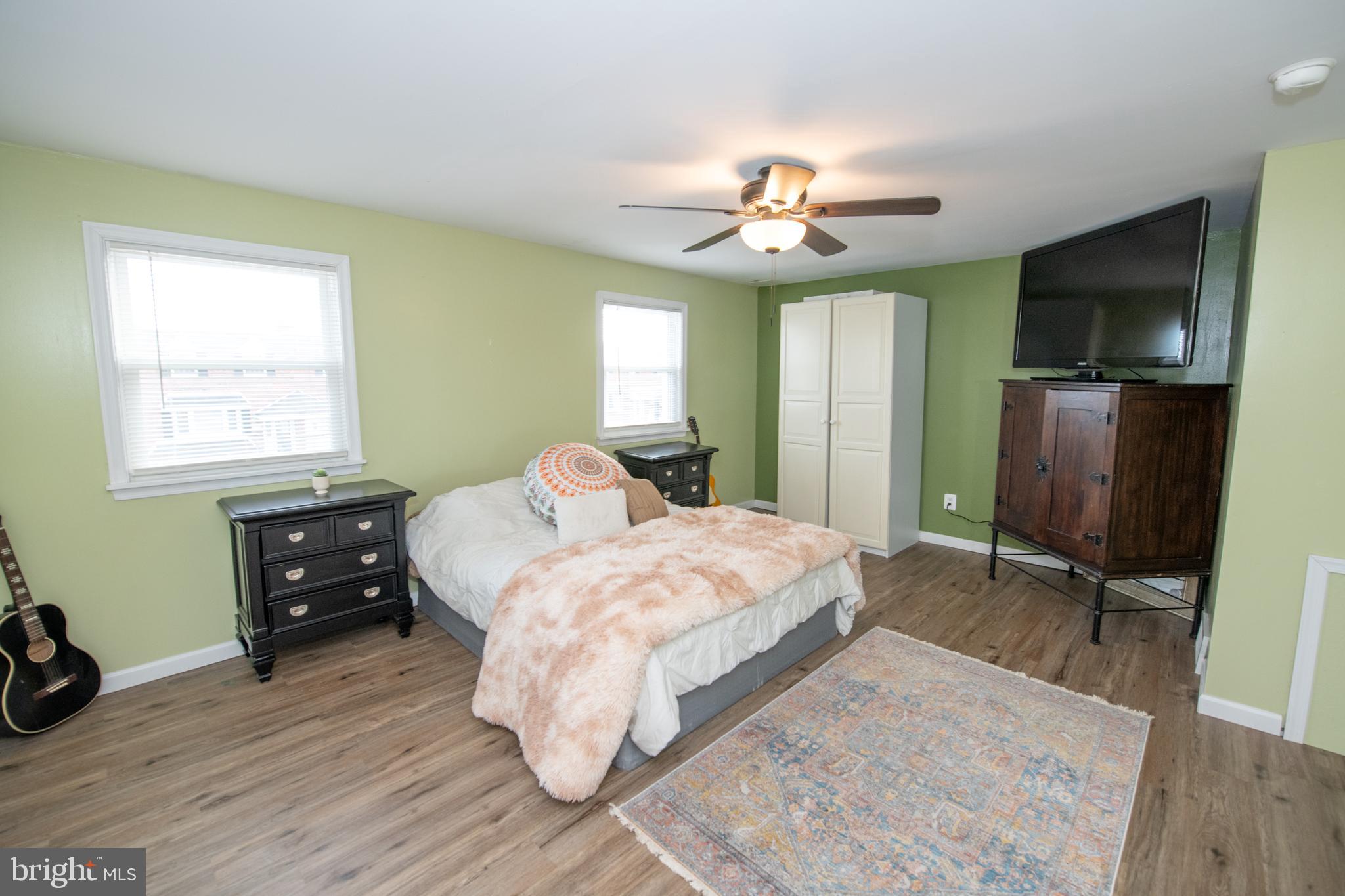 12506 Chilton Road Philadelphia, PA 19154 - Photo 26 of 55 a bedroom with a bed a window and flat screen tv
