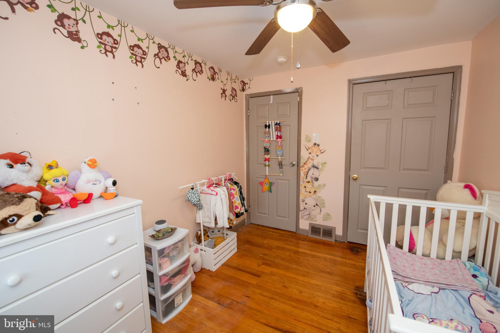 12506 Chilton Road Philadelphia, PA 19154 - Photo 33 of 55 a storage room with wooden floor and furniture