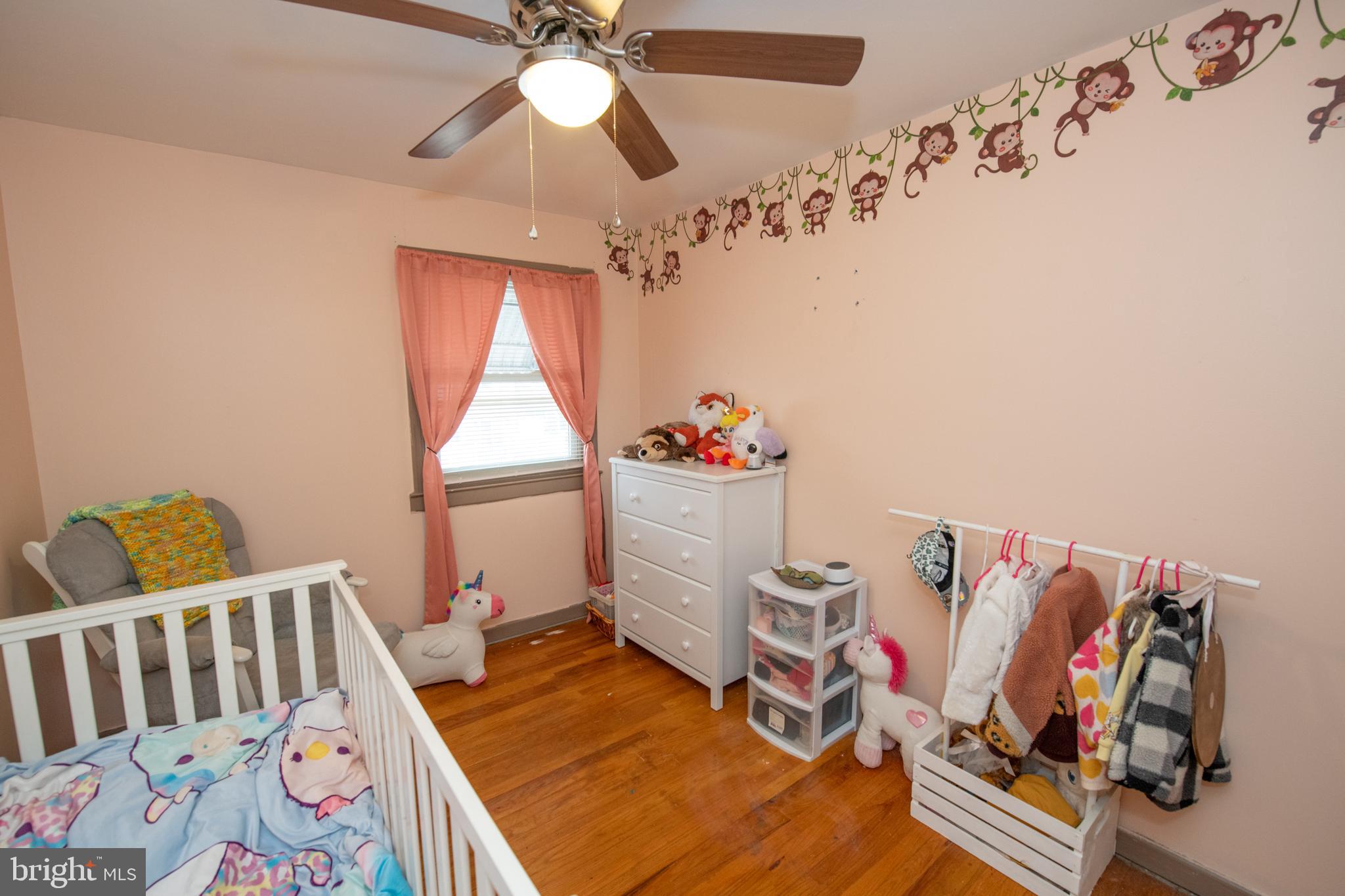 12506 Chilton Road Philadelphia, PA 19154 - Photo 34 of 55 a bedroom with furniture and a window