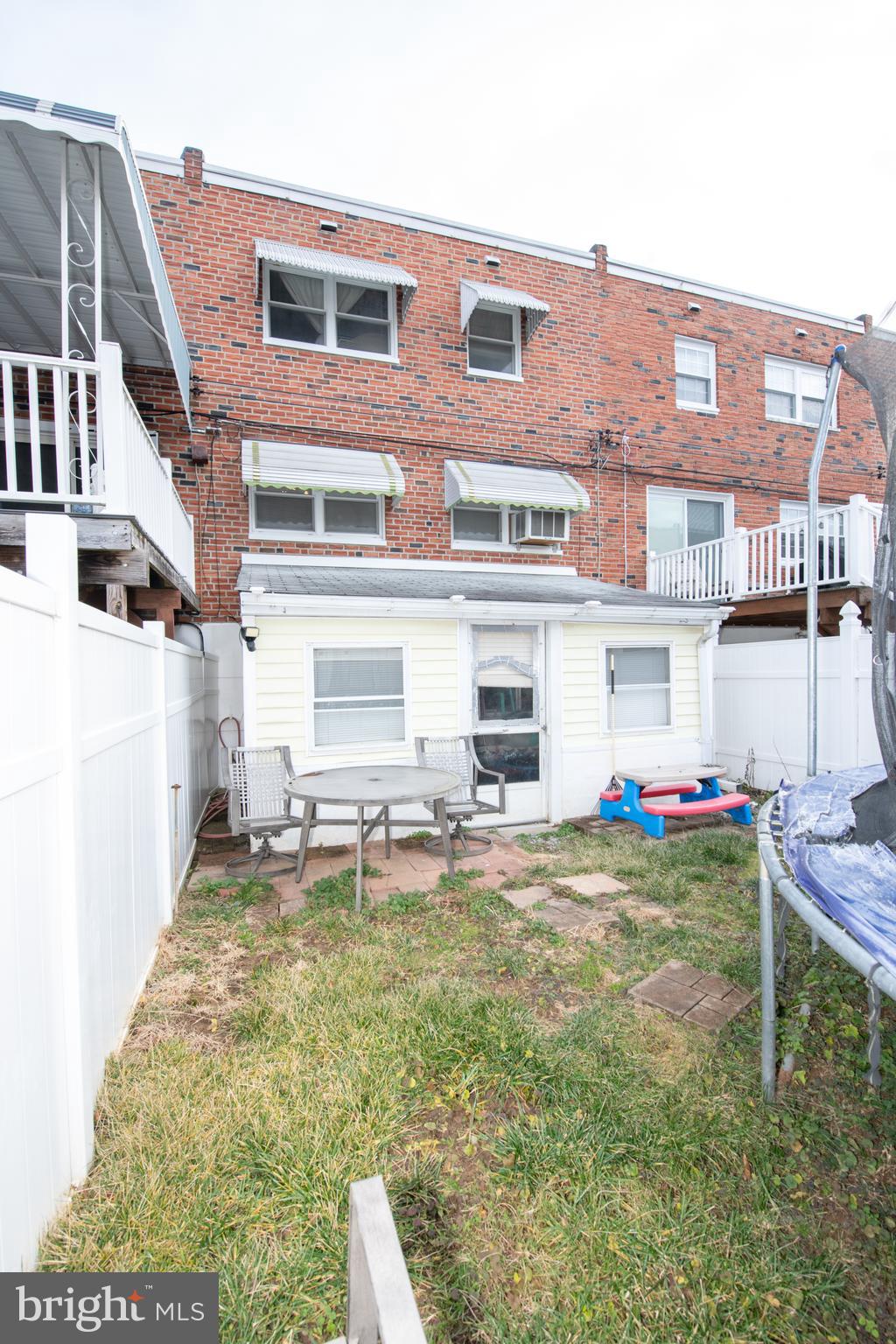 12506 Chilton Road Philadelphia, PA 19154 - Photo 54 of 55 a view of a house with a yard and sitting area