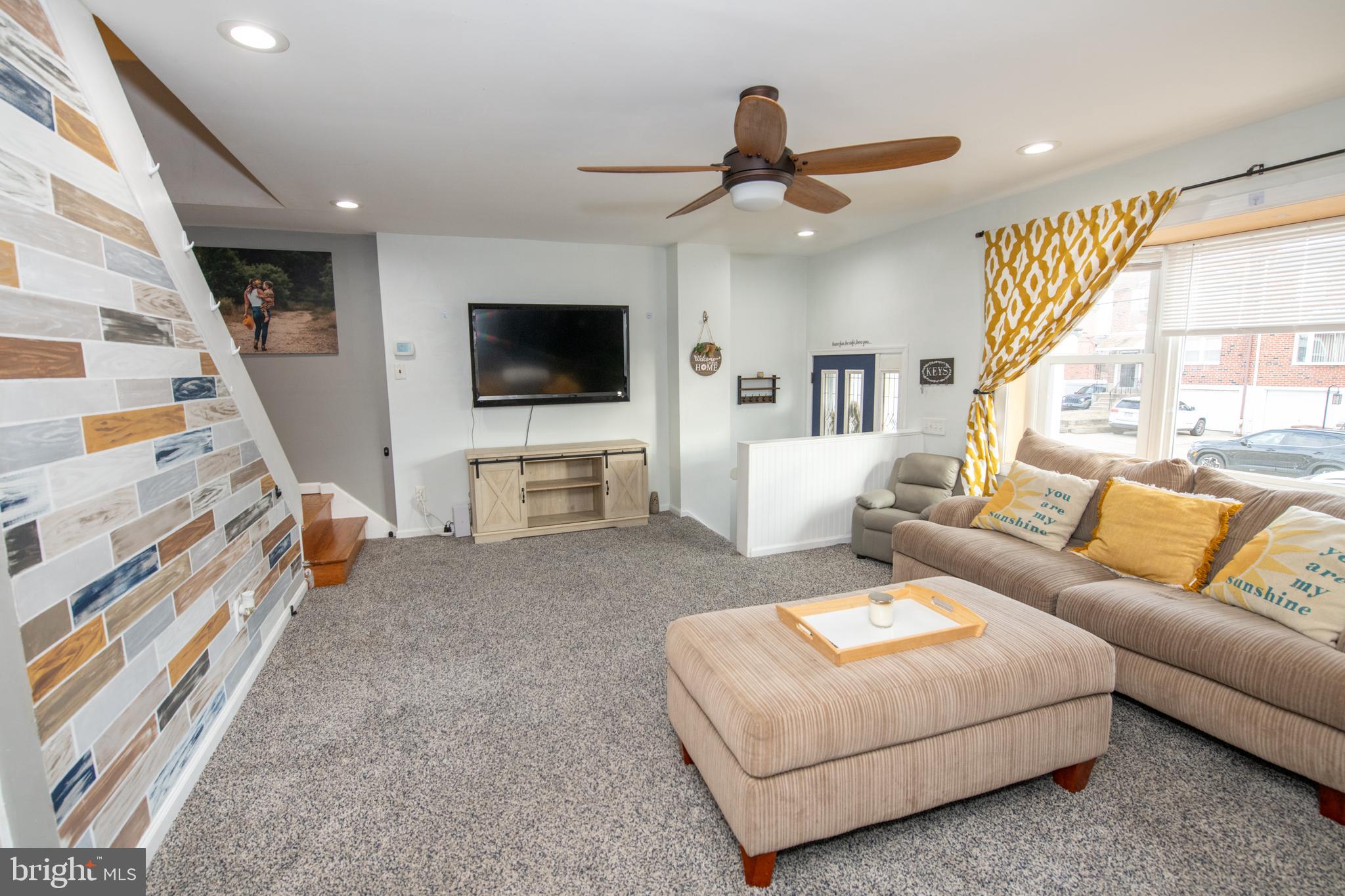 12506 Chilton Road Philadelphia, PA 19154 - Photo 10 of 55 a living room with furniture and a flat screen tv