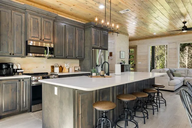 a bathroom with a shower and a sink