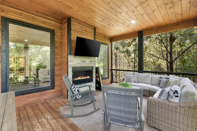 a bathroom with a sink a mirror and a shower