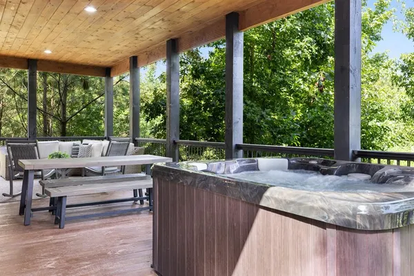 a view of a patio with a yard