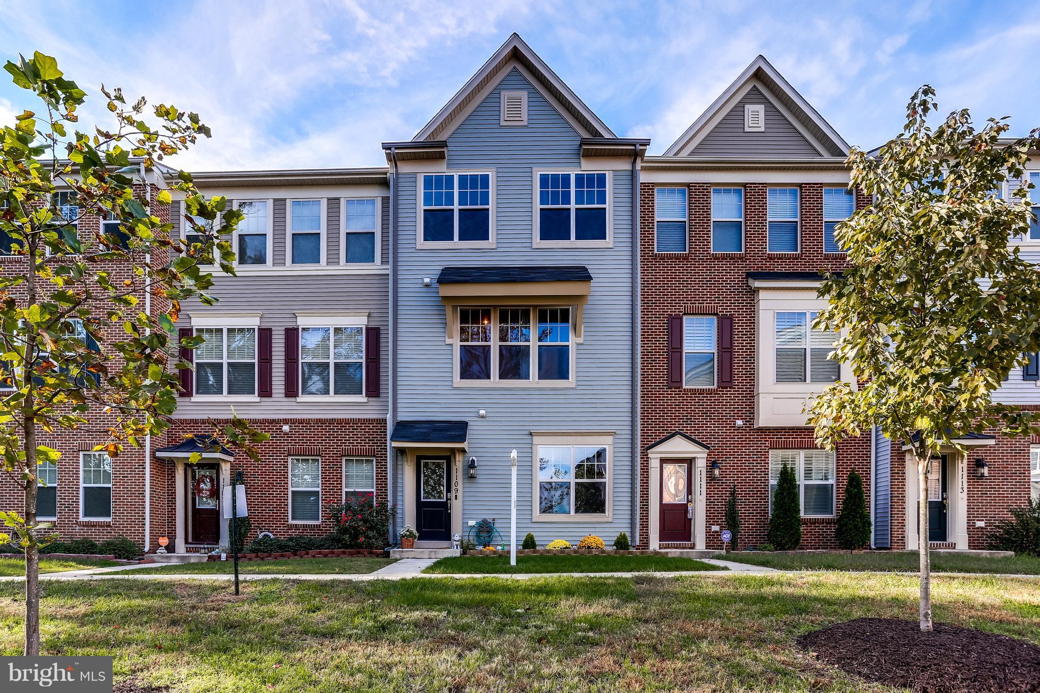 1109 Red Hawk Way Severn, MD 21144 - Photo 2 of 29 front view of a brick house next to a yard