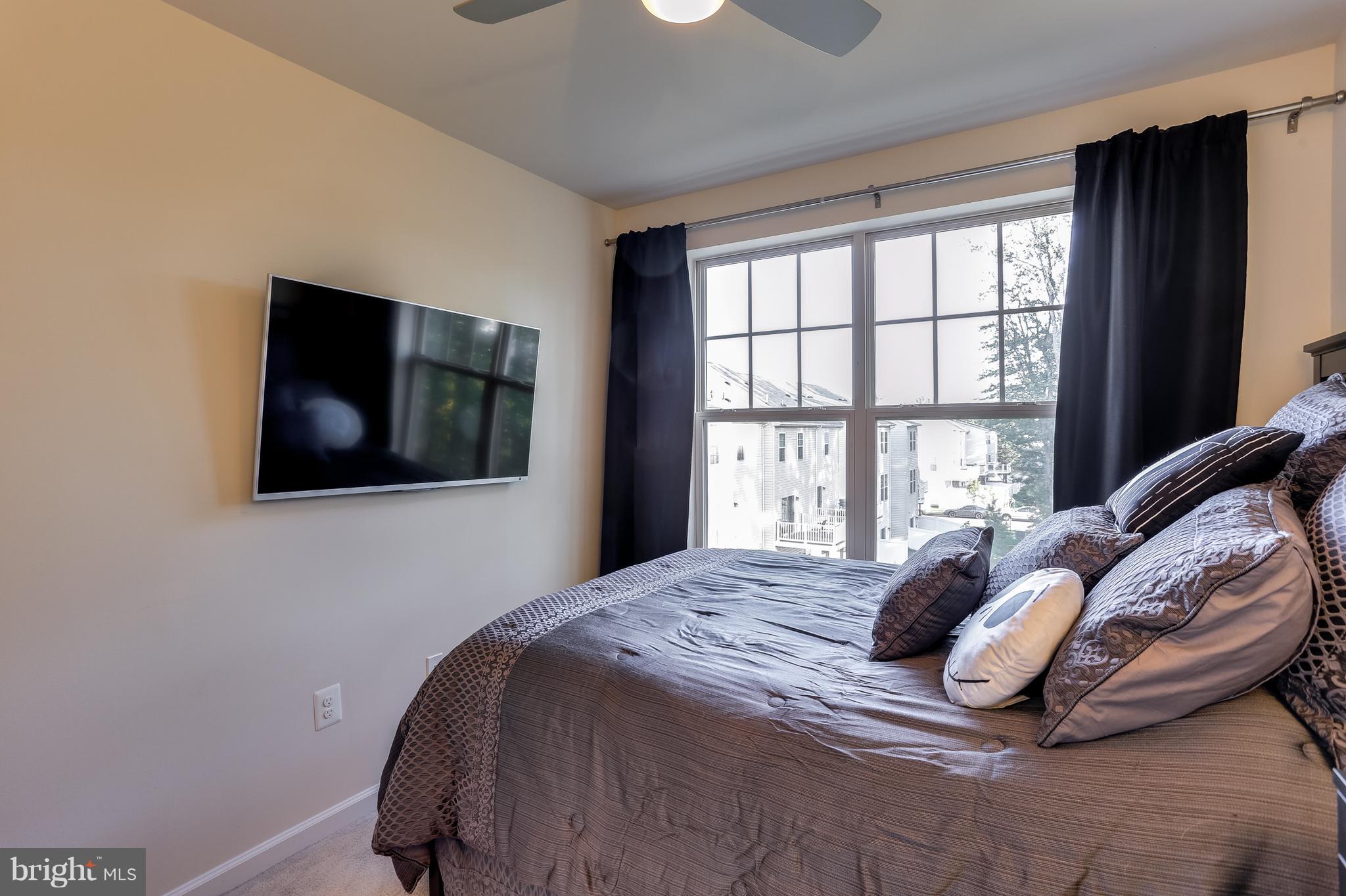 1109 Red Hawk Way Severn, MD 21144 - Photo 23 of 29 a bedroom with a bed and a window