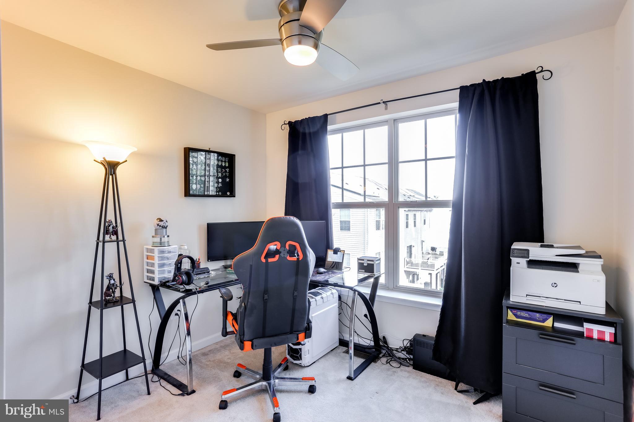 1109 Red Hawk Way Severn, MD 21144 - Photo 24 of 29 a view of a workspace with furniture and a window