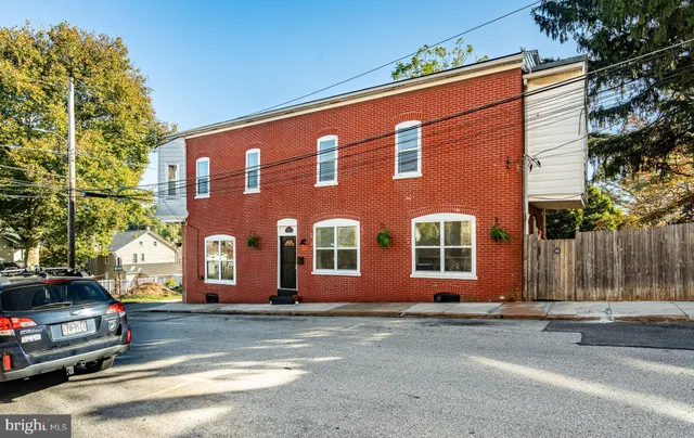 a view of a car park in front of a building
