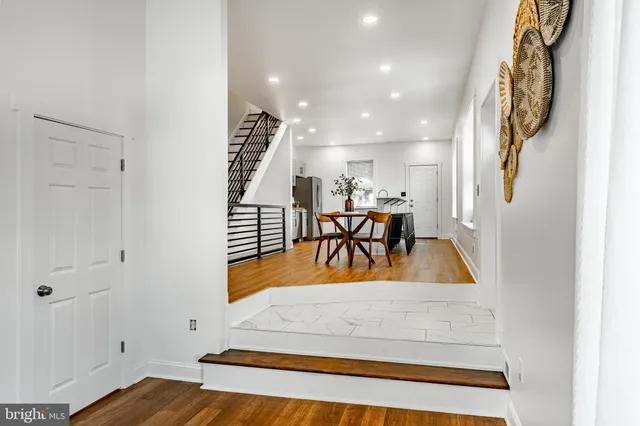 a view of living room and dining room