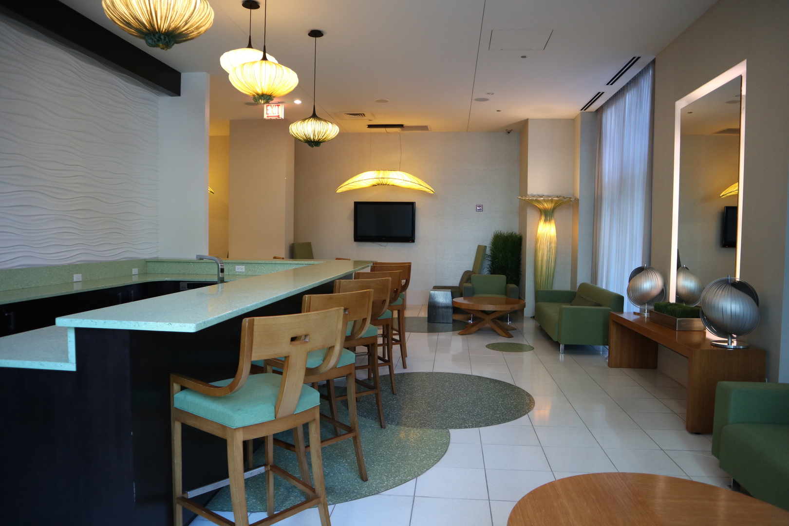 125 South Green Street, Unit 1202A Chicago, IL 60607 - Photo 11 of 15 a view of a dining room with furniture and wooden floor