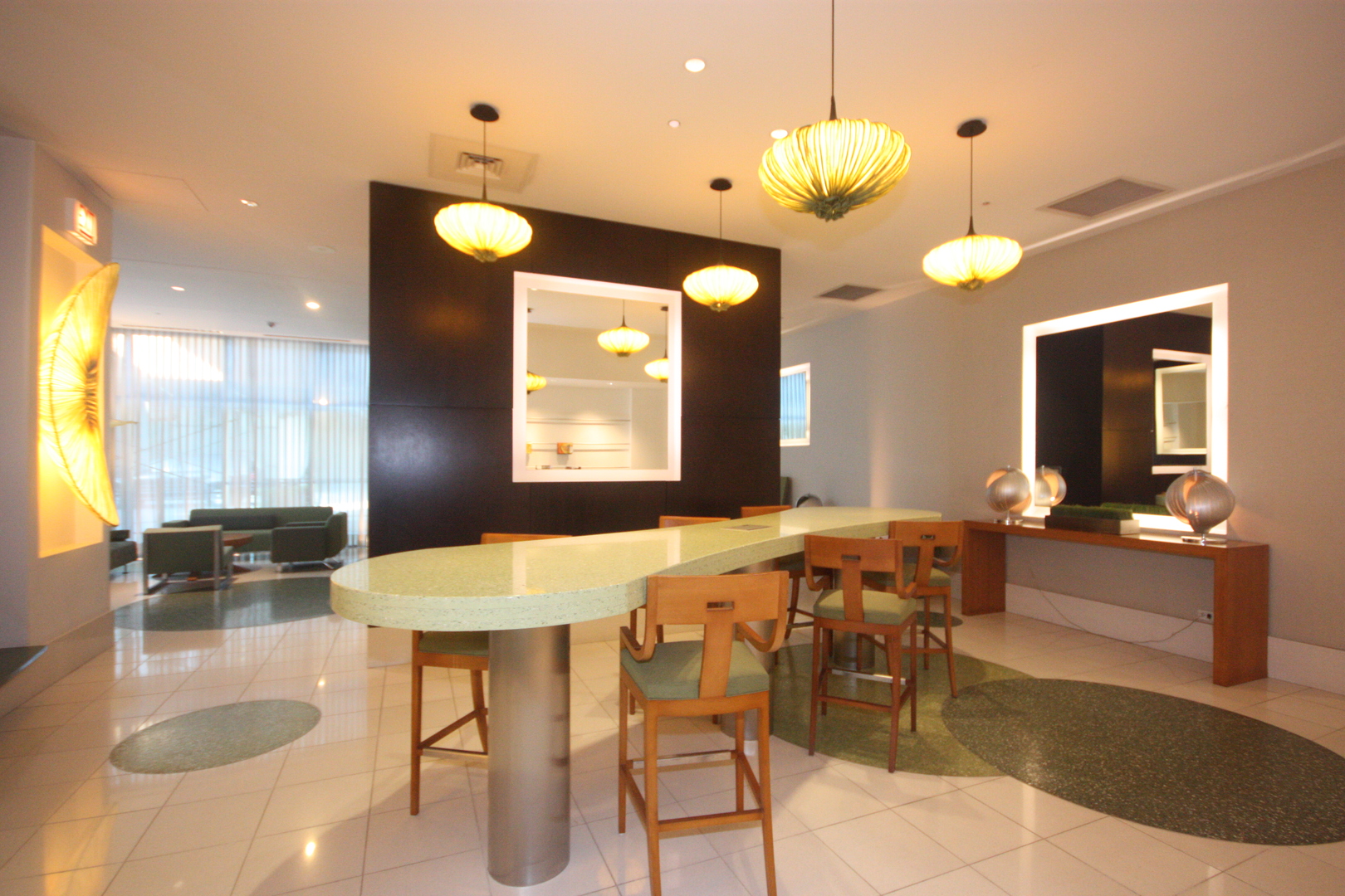 125 South Green Street, Unit 1202A Chicago, IL 60607 - Photo 13 of 15 a large kitchen with a table and chairs